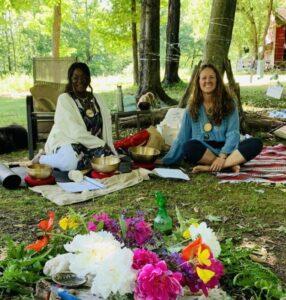 Saudia LaMont and Rae Carter outside at Grandmother Cherry Sanctuary in Vermont
